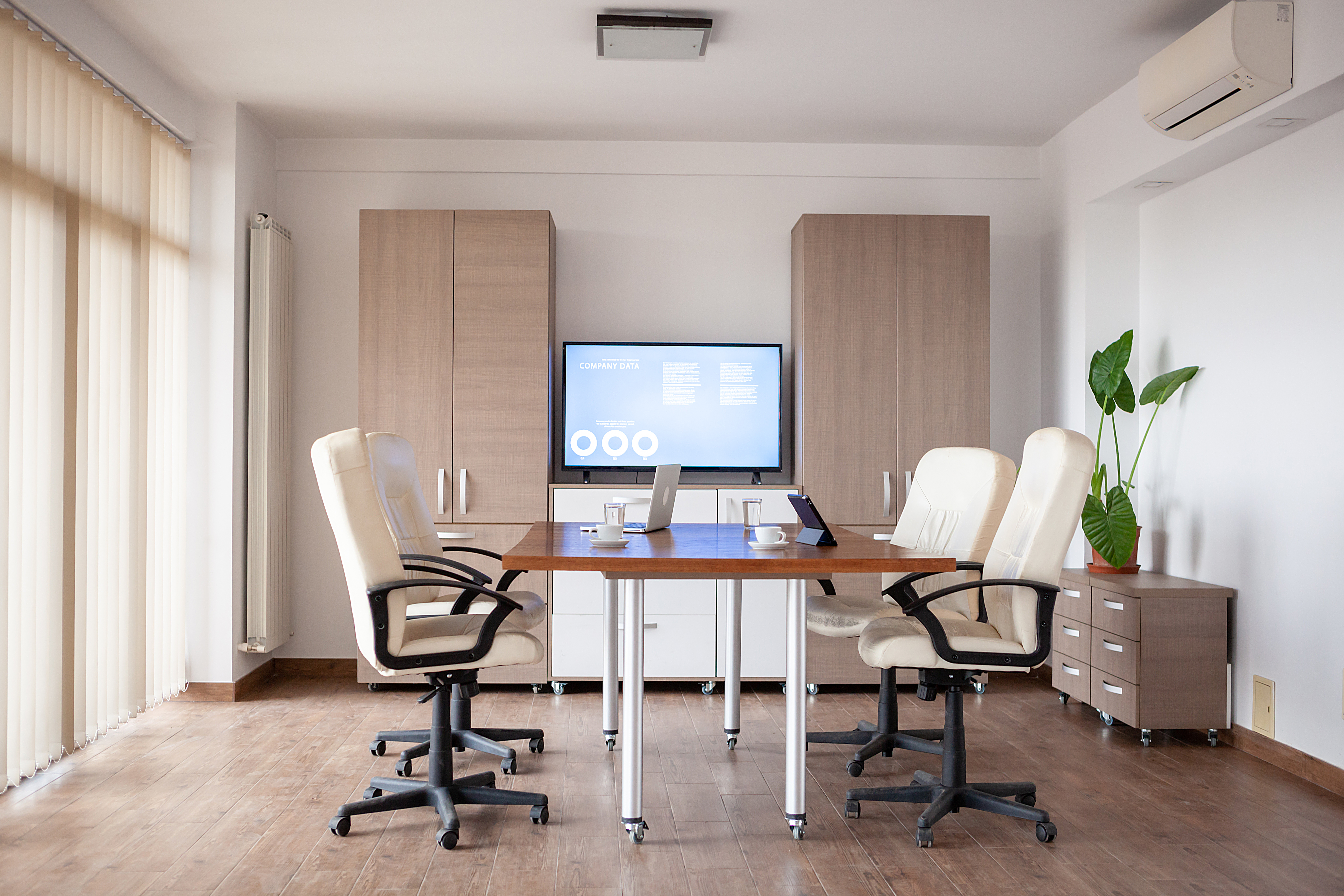 empty-conference-room-business-center-there-is-tv-displaying-some-graphs-charts-background.jpg